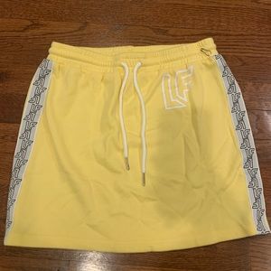 LF yellow mini skirt